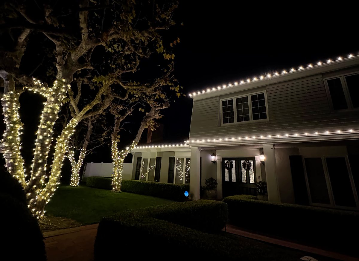 Wrapped trees and a two-story roofline